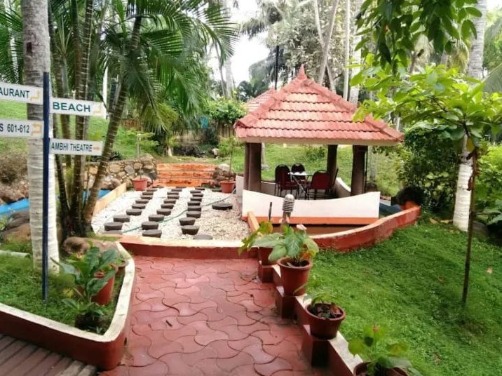 Garden sit-out with thatched roof